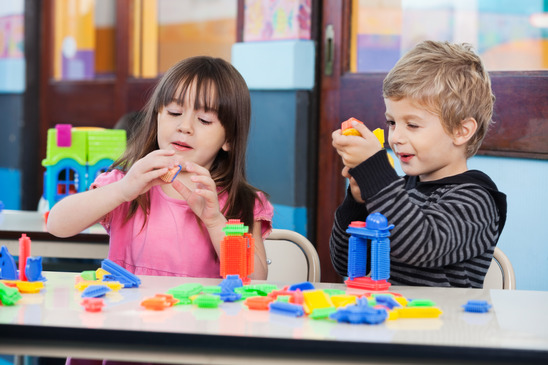 children-playing-with-blocks-in-classroom-xs.jpg